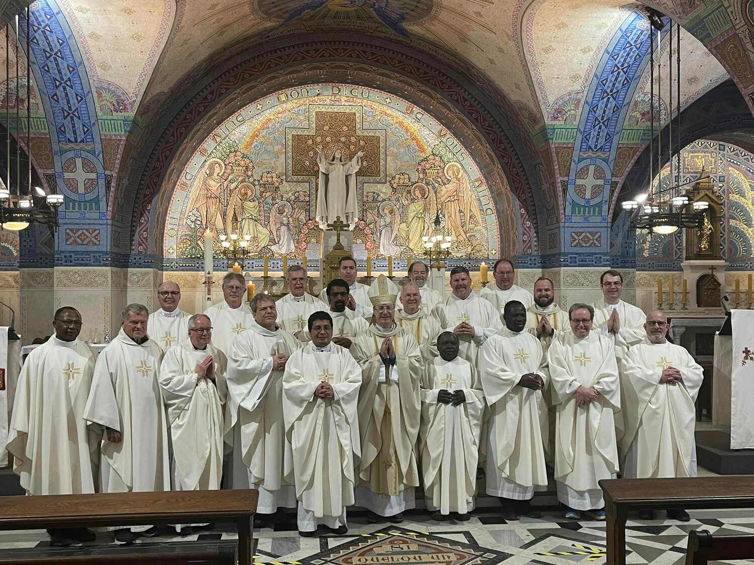 Priests of the Jefferson City diocese and Bishop W. Shawn McKnight gather for a photo in the sanctuary of the Crypt Church in the Basilica of Sainte-Thérèse in Lisieux, near the end of their priestly pilgrimage to France.